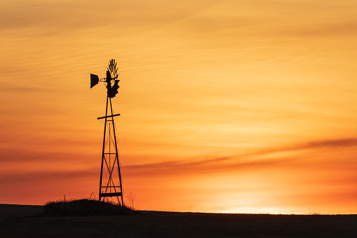 USA, Washington State, Whitman County. Windmill at sunset in the Palouse hills.