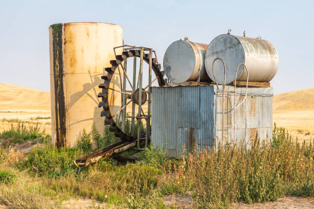 istock An old water wheel and other equipment. 1422036536
