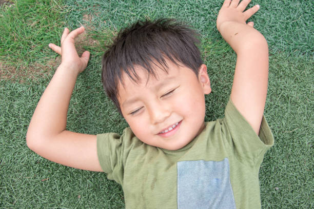istock Japanese boy crying in the park 1422051013