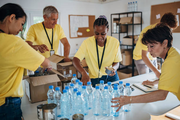 istock People working for charity together 1422052224
