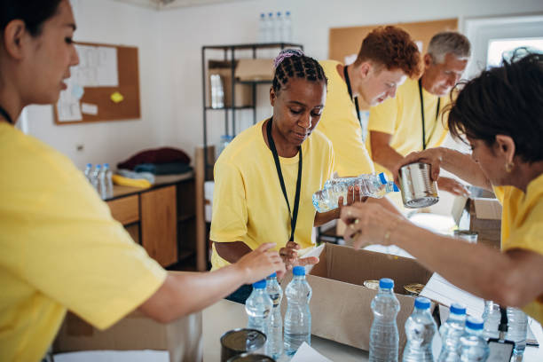 istock People working for charity together 1422052260