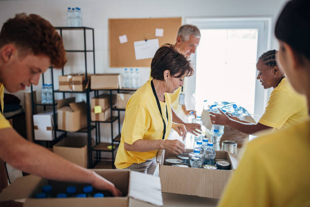 istock People working for charity together 1422053097