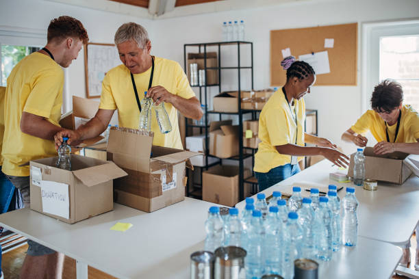 istock People working for charity together 1422053165