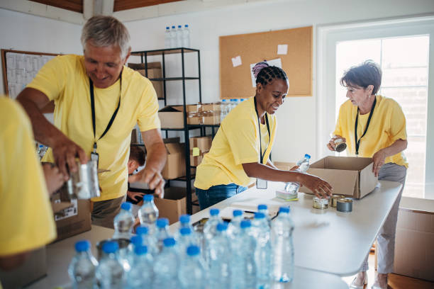 istock People working for charity together 1422053188