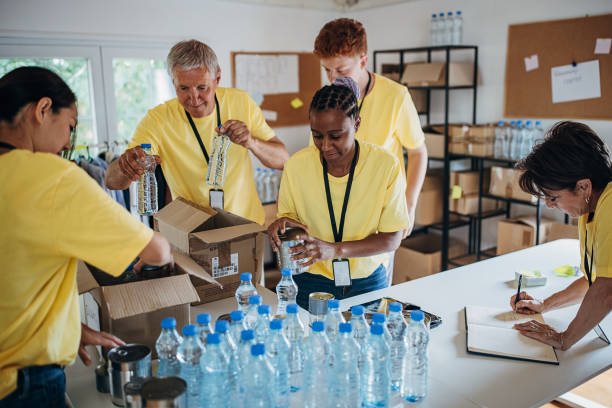 istock People working for charity together 1422053255