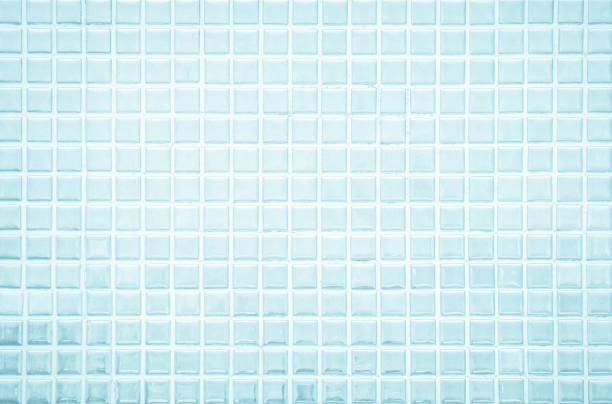 istock Blue light ceramic wall and floor tiles mosaic background in bathroom and kitchen. Design pattern geometric with grid wallpaper texture decoration pool. Simple seamless abstract surface clean. 1422055509
