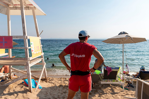 Lifeguard on Lagomandra beach to ensure safety on the beach. Bathing season in Greece.Summer vacation