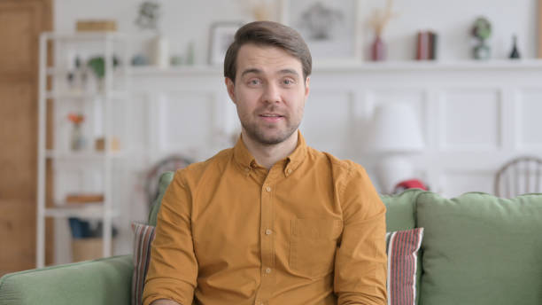 istock Portrait of Young Man Talking on Video Call 1422059281