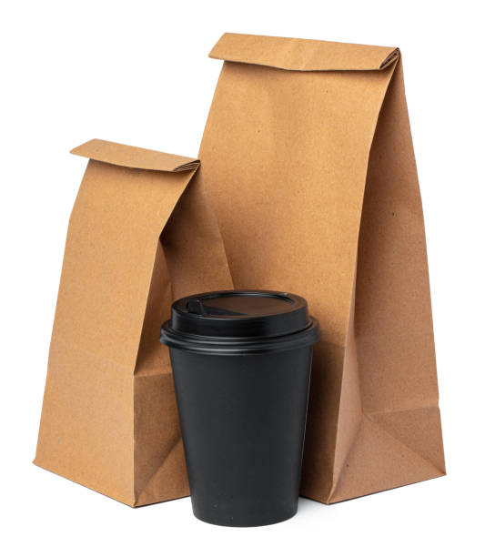 istock Craft paper bag with coffee cup on white background 1422063335