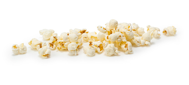 Lots of popcorn on a white background.
