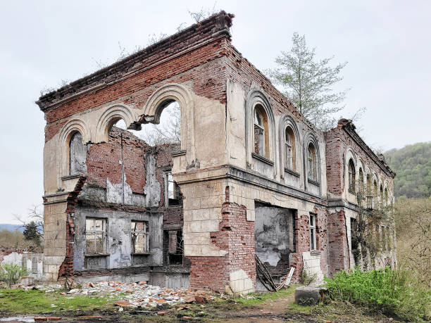 istock Destroyed brick house with arched openings after the war. 1422071346