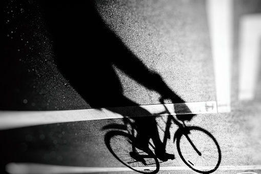 Image of shadow of running bicycle