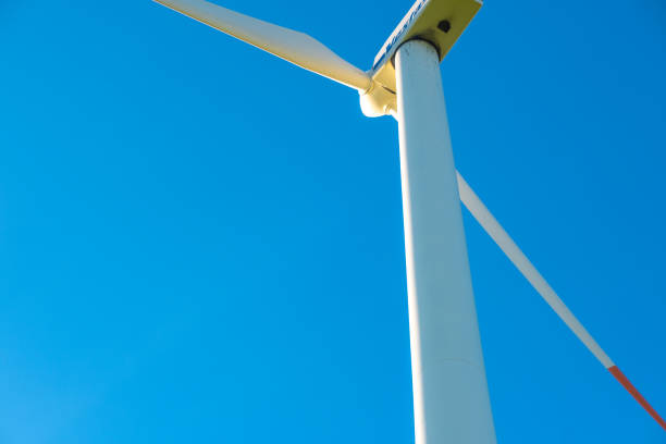 istock Wind generator on a blue sky background.Natural renewable clean energy.renewable energy.Rotation of the blades of wind generators. Alternative energy sources 1422074669