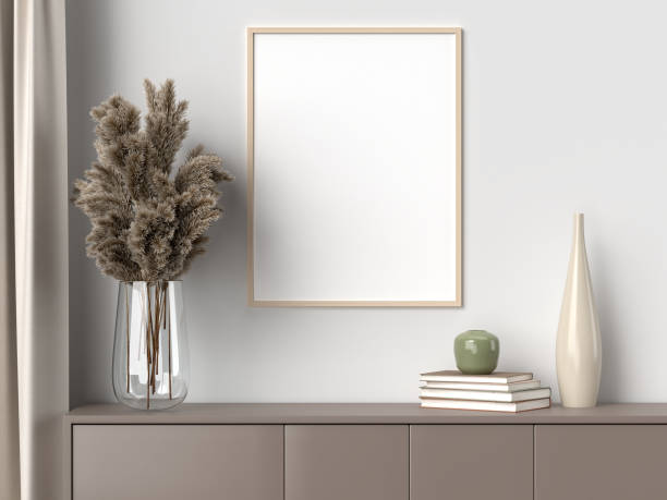 istock Blank picture frame for photographs, art, graphics with Leaves. Frame poster mockup template on the wall in home interior. 3D rendering 1422075332