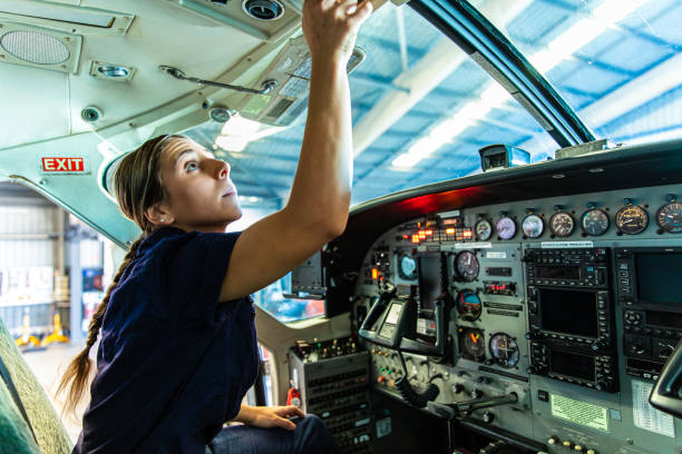 istock Real life young female aircraft engineer apprentice at work 1422090455