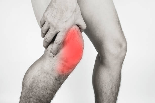 istock knee pain man He puts his hands on his knees, pain points from osteoarthritis and bone diseases, medical concepts and treatments. 1422095066