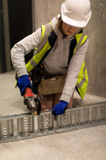 Real life female electrician at work