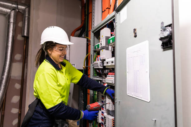 istock Real life female electrician at work 1422098972