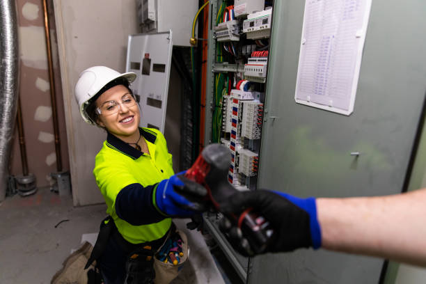 Real life female electrician at work