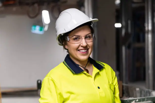 Photo of Portrait of a real life female electrician at work