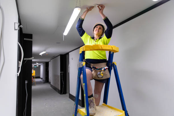 Real life female electrician at work