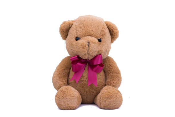 istock Cute brown teddy bear on a white scene. 1422105786