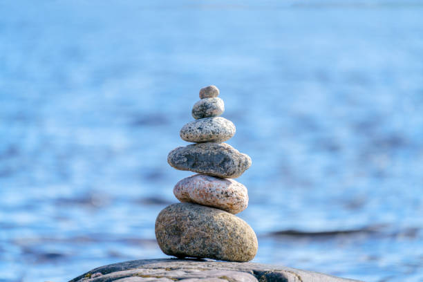 istock Pyramid of stones. Unstable balance of stone objects. 1422107022