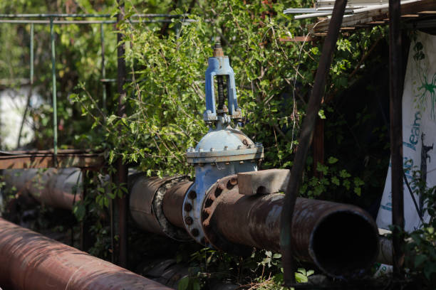 istock Details with old and rusty pipelines at a Romanian abandoned power plant. 1422115131