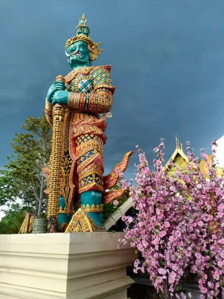 Giant statue of the gatekeeper of Wat Doi Kham, Chiang Mai