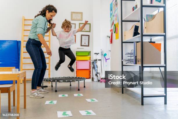 Down Syndrome Occupational Therapy Stock Photo - Download Image Now - Child, Occupational Therapy, Autism