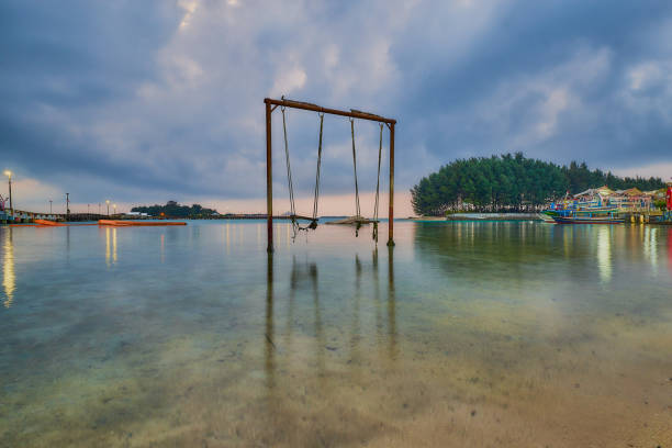 the view on the beach in the morning with a beautiful sunrise