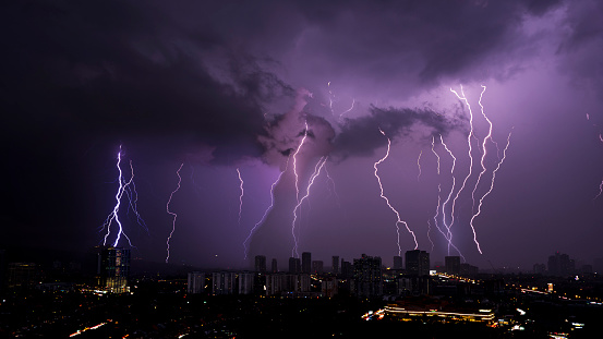 Thunder, lightnings and rain on stormy summer night.