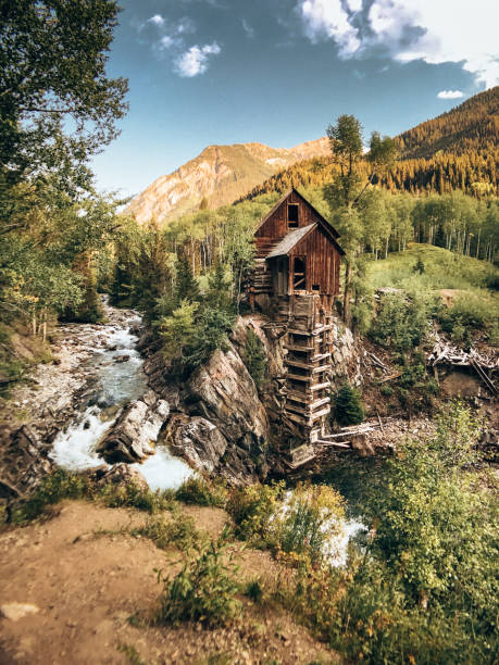 istock log cabin in the forest in colorado 1422125142