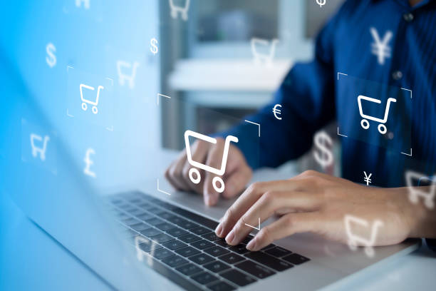 istock Businessman using computer and touch virtual screen online shopping. And online payment option or digital wallet online transaction concept. 1422125660