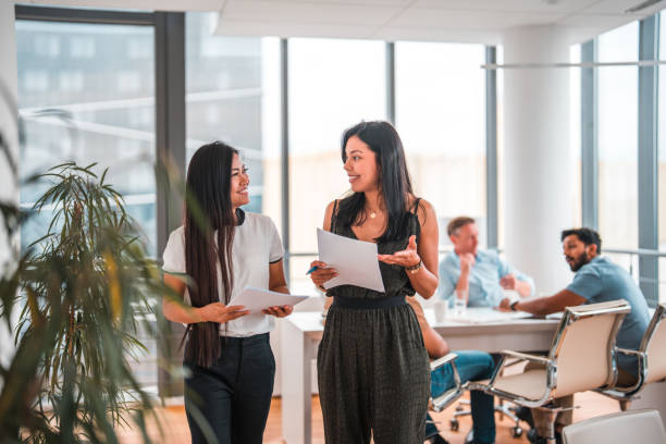istock Joyful Multi-Ethnic Women Working In A Financial Company 1422128180