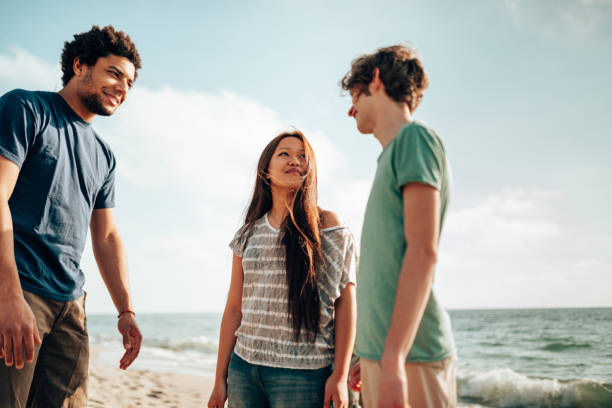 istock friends dancing at the beach party 1422135650