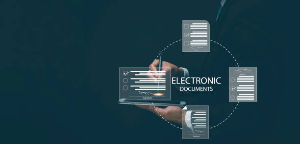 istock Signing electronic documents on digital documents Online, businessman with contract Electronic signature, e-signing, digital document management, paperless office, signing business contract concept, 1422136635