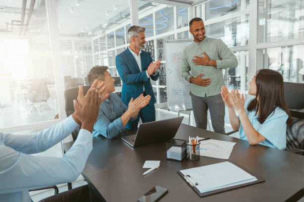 istock Group of multiethnic business people working together on project while sitting in modern office 1422138865