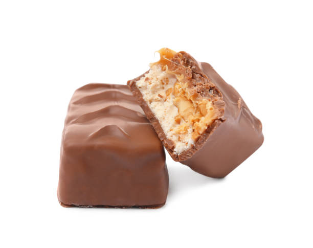 istock Chocolate bars with caramel, nuts and nougat isolated on white 1422141912