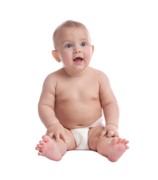 istock Cute baby in dry soft diaper sitting on white background 1422143340