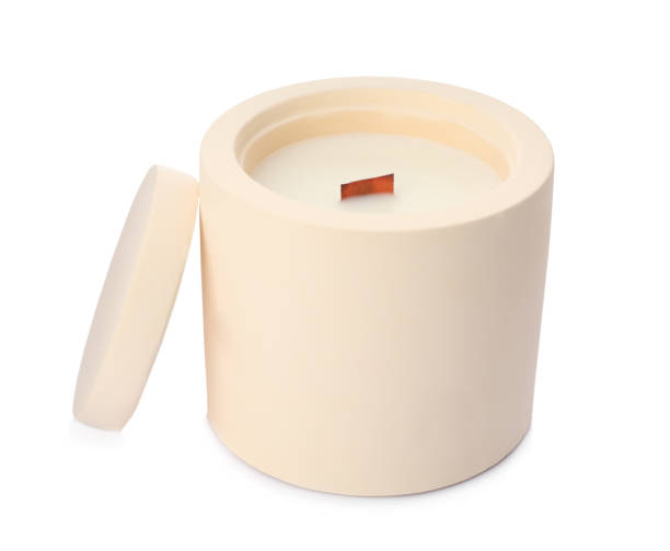 istock Aromatic soy candle with wooden wick isolated on white 1422150309
