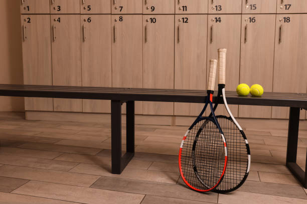 istock Tennis racket and balls in locker room 1422157285