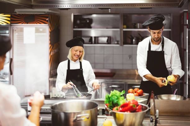 istock Group of Chef Preparing Food 1422159783