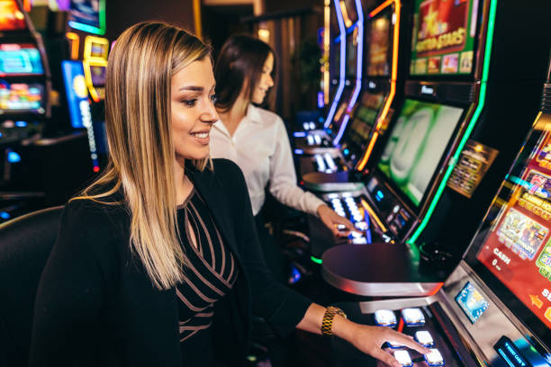 istock Two girls gambling, lucky win 1422161170