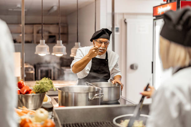 istock Group of Chef Preparing Food 1422162771