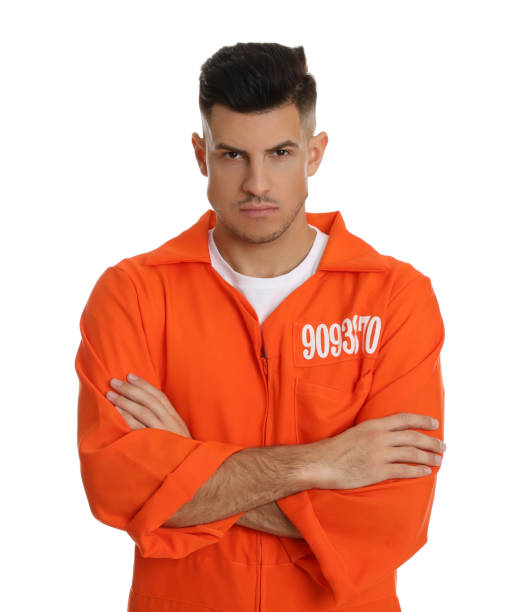 istock Prisoner in orange jumpsuit on white background 1422164785