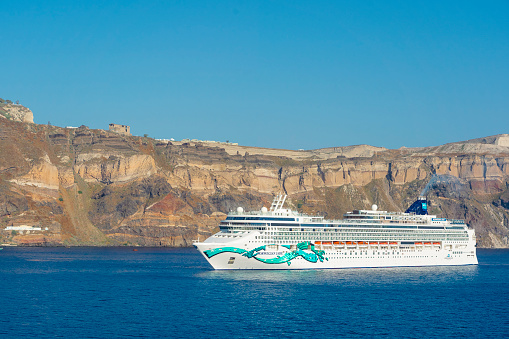 Norwegian Jade of Norwegian Cruise Line moored in Santorini on June 05, 2022 in Santorini, Greece.