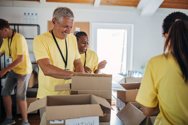 istock People working for charity together 1422168176