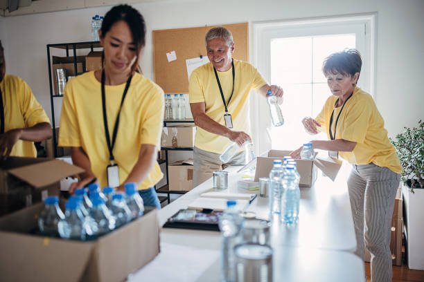istock People working for charity together 1422168280