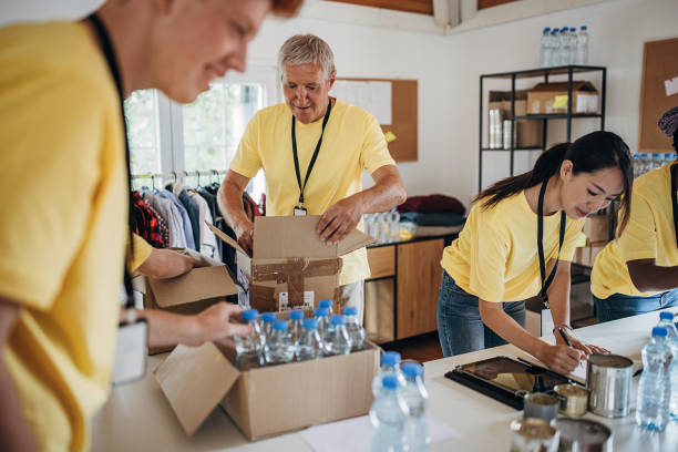 istock People working for charity together 1422168643